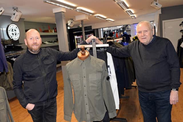 Carl and Ron Bradley, pictured at their High Street Menswear store. Picture: NDFP-18-12-18-BradleyKnipe-1