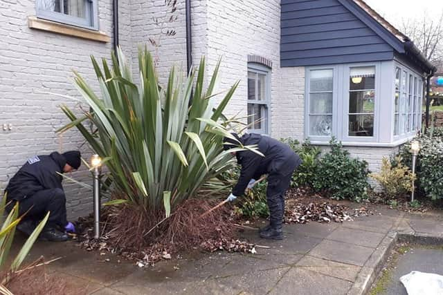 Police officers searched the land out outside a Doncaster pub where a man was shot dead