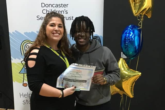 Winner of the Improving Peoples Lives trophy at the Doncaster Childrens Services Trust Star Awards, Alex Stevenson, presented by Trust Young Advisor Fanso Maria