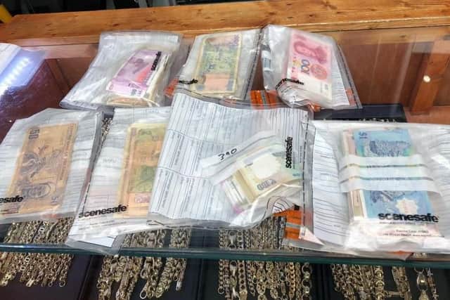 Foreign currency was seized in a police operation in Doncaster this morning