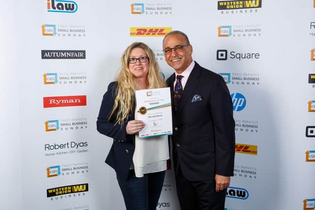 Rachel Whittaker with Theo Paphitis at award show.