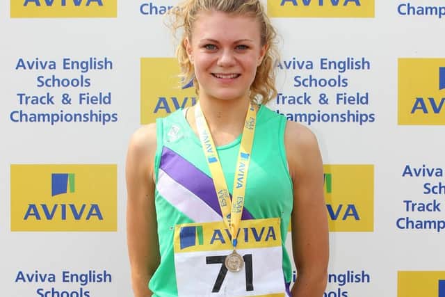 GATESHEAD, ENGLAND - JULY 7:  Beth Dobbin of South Yorkshire poses with her medal after placing second in the Senior Girls 200m Final during day two of the Aviva English Schools Track and Field Championships at the Gateshead International Stadium on July 7, 2012 in Gateshead, England. Search Aviva Athletics on Facebook to Back The Team. (Photo by Getty Images for Aviva)