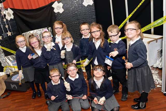 Year one school children pictured by the crash site in the school hall. Picture: Marie Caley NDFP-08-01-19-RocketCrash-1