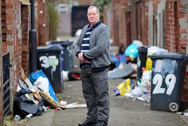 Steve Parsons, pictured, has had enough of the persistent fly-tipping in the backs between Ellerker Avenue and Stone Close Avenue, Hexthorpe. Picture: NDFP-19-03-19-Flytipping-8