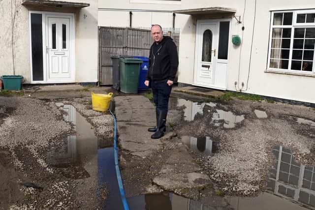 David Jeeves, pictured on his front drive, which along with the back garden suffer from constant flooding. Picture: Marie Caley