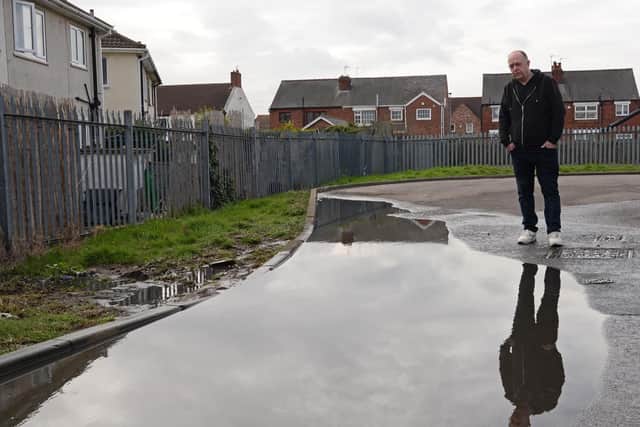 David Jeeves, pictured at the rear of his property, where the water is pooling and then flooding into his garden. Picture: Marie Caley