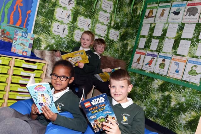 Year two children Isabella Remy, six, Millie Haggerty, six, Leo Sables, six and Oliver Beckett, seven, pictured in the Reading Area. Picture: Marie Caley NDFP-26-02-19-CarrLodge-4