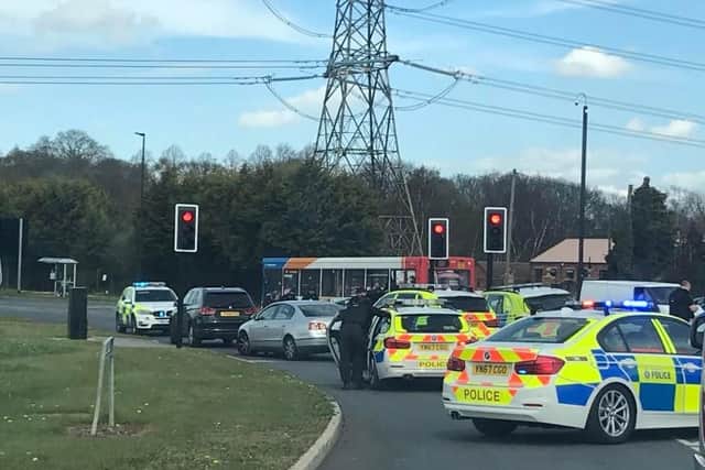 Armed police officers surrounded a car in Doncaster earlier this afternoon