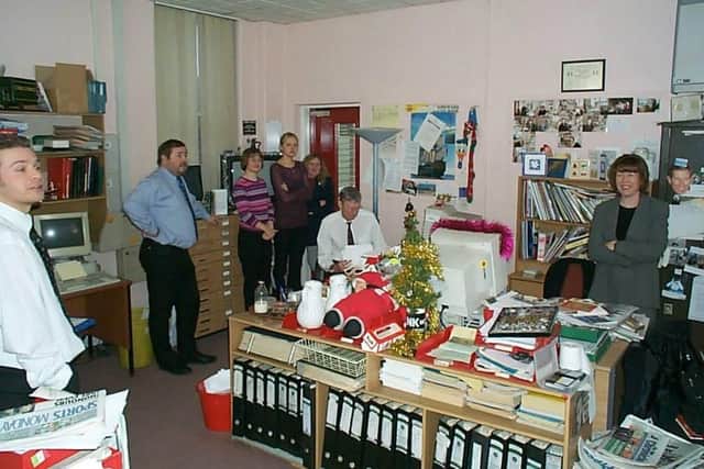 Peter Whittell (centre) in the former Doncaster Free Press newsroom on his retirement day.