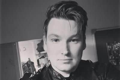 Musician Taylor Payne found Sasha the dog inside his car.