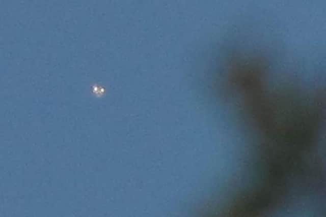 Julie and her daughter Abigail watched the UFO moving strangely around the skies for 15 minutes. (Photo: Julie Marley)