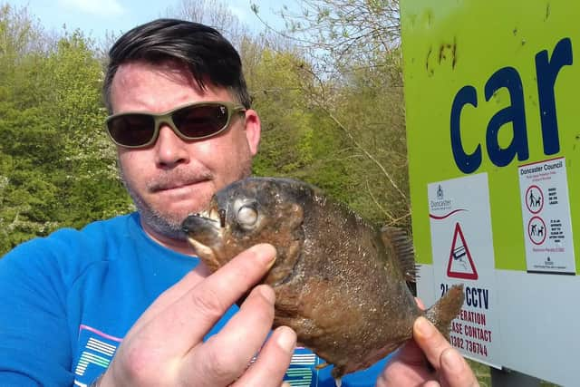 Davey White found one of the two piranhas at Martinwells Lake.