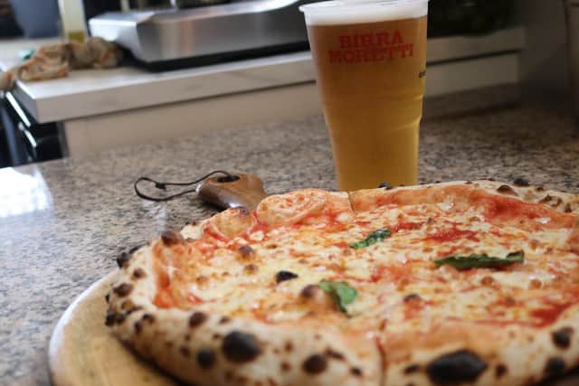 Pizza with Italian Beer.