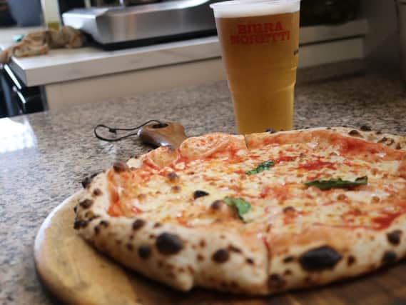 Pizza with Italian Beer.