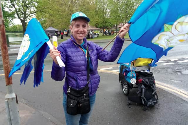 Tracy Ball was selling Yorkshire flags to spectators at the Tour de Yorkshire next to Askern Lake