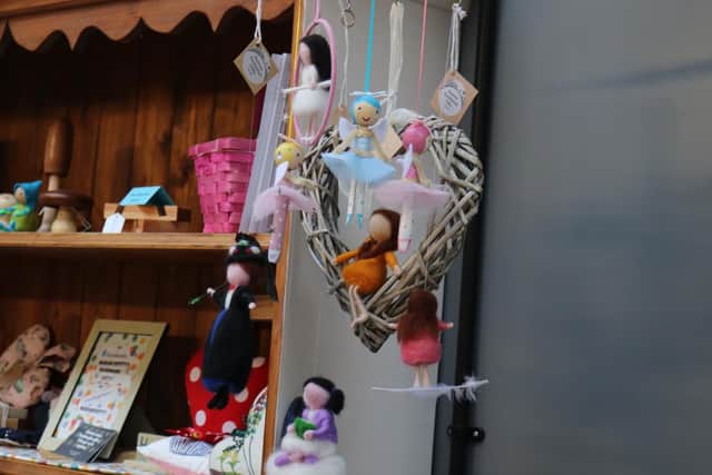 Wooden dolls in the shop.