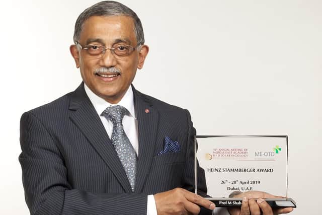 Mr Muhammad Shahed Quraishi OBE with award