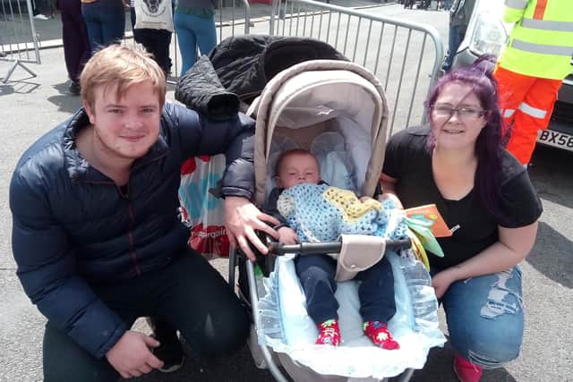 Film crews were shooting Still Open All Hours at Lister Avenue, Doncaster, on June 3, 2019. Pictured are Peter Broomhead, 22, and Terrie Kerrison, 24, with baby son Kayden, 10 months.