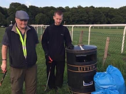 Litter pickers on a recent outing gathering rubbish.