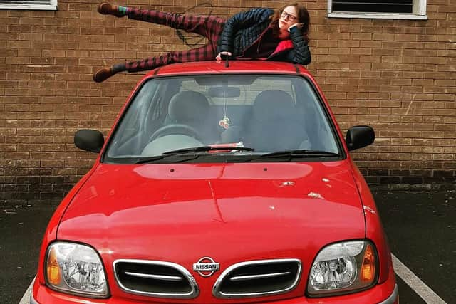 Fergus with his Nissan Micra that's for sale.