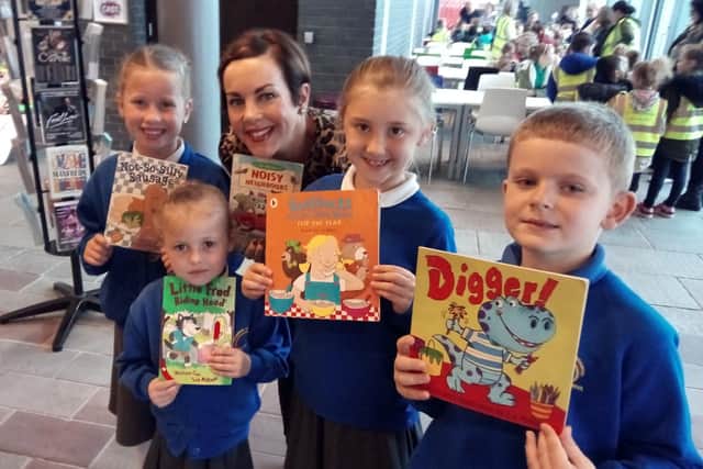 Pupils from Southfield Primary School, Armthorpe, with book illustrator Liz Million, during at Cast theatre, Doncaster