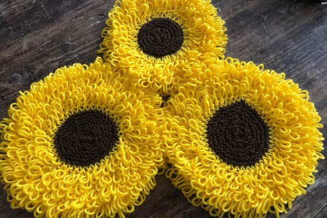 Mama Wheatley's craft club sunflower creation for yarn bomb 2019.