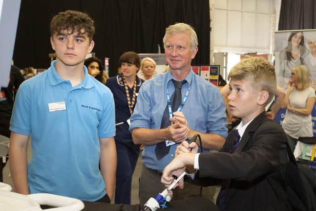 A year eight pupil tried his hand at a surgery simulator at the Doncaster Dome at an NHS careers awarenress event