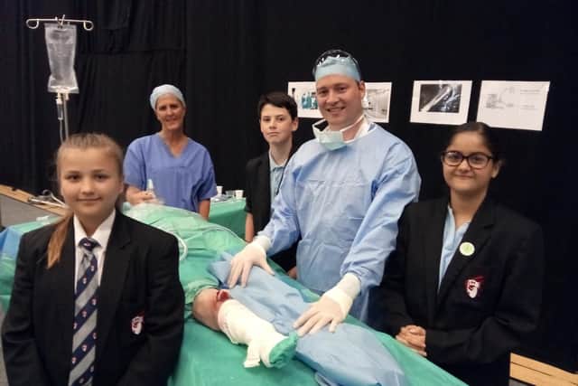 Pictured left to right are Nikola Dorsz, aged 13, nurse and education lead Gail Eden, James Flanagan, 13, orthopedic consultant Scott McInnes, and Ava Moore, 13, at the We Care -  Into the Future health careers event at Doncaster Dome