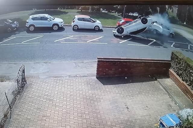 A still from the video of the crash taken from the front of Paul Tompkins' house on Armthorpe Lane in Doncaster.