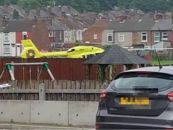 The Yorkshire Air Ambulance lands.