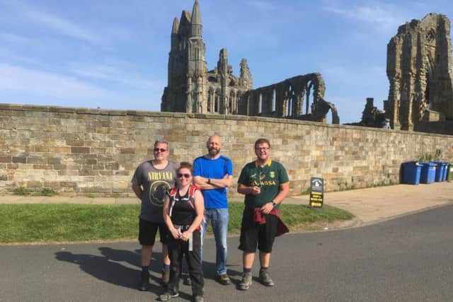The team at the end of their expedition at Whitby Abbey.