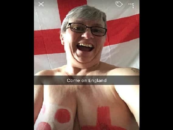 Catherine Higgins shows off her support for England.