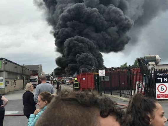 Plumes of smoke rising from the scene.