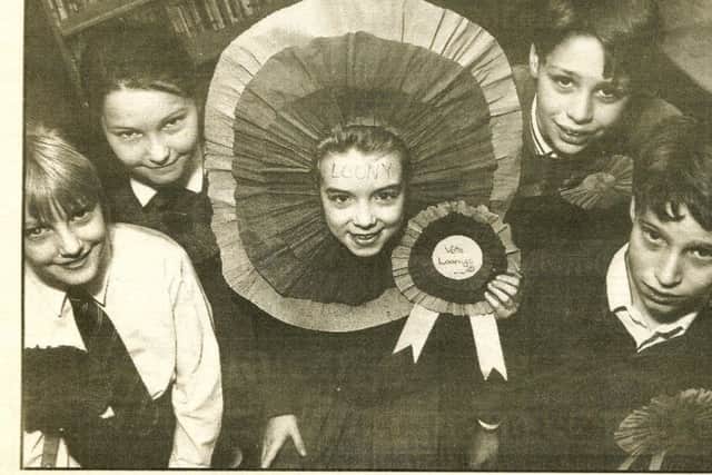 A cutting from a Bells/Advertiser produced newspaper to mark the 10th anniversary of the opening of the school. The young girl in the centre of the photograph - Sheridan Smith - is currently starring in London's West End theatre production of The Little Show of Horrors and the boy pictured second from the right - Jonathan Whittaker - was elected onto Epworth Town Council earlier this month.
But what has happened to the other youngsters,who are (from left) Joanne Stockhill, Kerry Stewart and Jody Parkin.