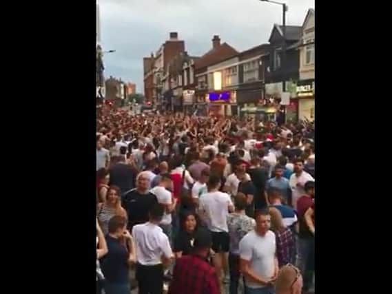 England fans celebrate last night's win in Silver Street.