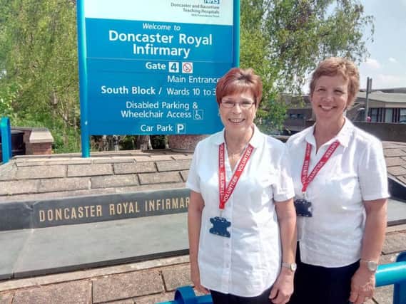 Doncaster Royal Infirmary volunteers Pauline Handley and Lynn Buxton  
Writer:
