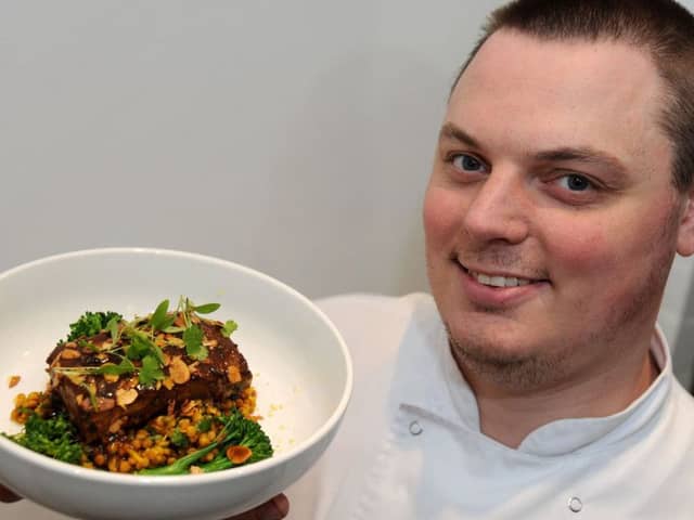 The Devonshire Arms at Beeley. Head chef Lewis Thornhill with a plate of Chatsworth Lamb.