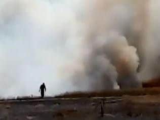 A firefighter battles the blaze on Hatfield Colliery spoil heap