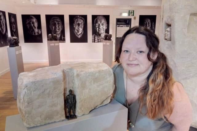 Jo McQuade, miners daughter and local government officer, with a model of the proposed Doncaster mining memorial