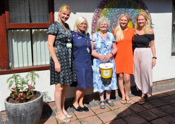 Barbara West (centre) is pictured at the Hospice with granddaughters Kerri (second right) and Lauren (right) and Lindsey Lodge Senior Nurse Karen Andrew (second left) and Fundraiser Selina Doyle (left)
