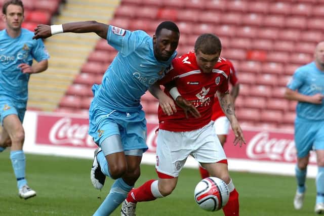 Rovers' Jason Euell tussles with Trippier for the ball.