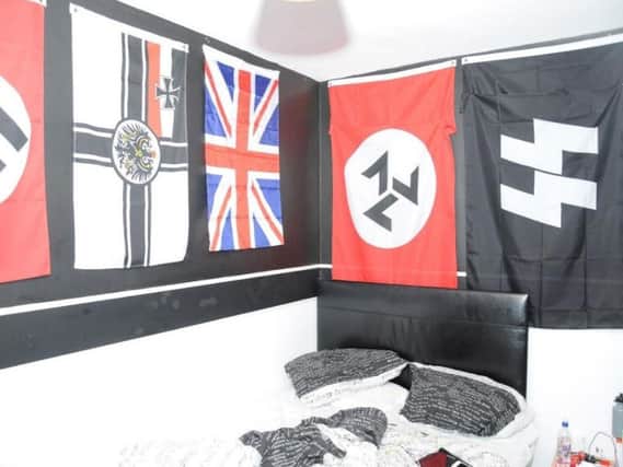 The bedroom filled with Nazi flags alongside the Union flag. Photo: PA