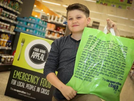 Young shopper Noah Bailey is backing the Central England Co-op Summer Food Bank Appeal