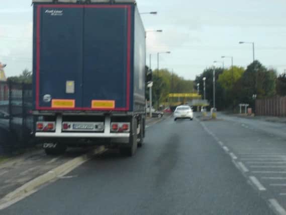 A lorry parked on the pavement at an industrial estate in Adwick