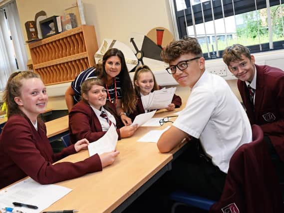 Catherine Matthews, Doncaster Chamber Business and Education Advisor, pictured with year 11 pupils at Trinity Academy. Picture: NDFP Skills Academy MC 1 
Picture:  Marie Caley