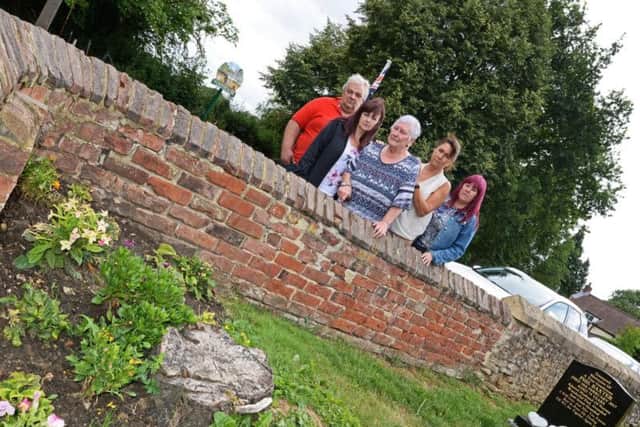 Norma Baxter pictured near to Phillip's grave with Steve Richards, Andrea Hutchinson, Annette Webb and Deb Rutter, friends and supporters of Norma