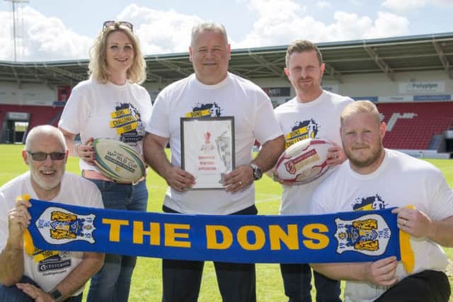 Chris Dungworth (Business Doncaster), Lorna Reeve (visit Doncaster ), Carl Hall (Doncaster RLFC), Dean Wiffen (Doncaster council), Ben Lewis (keepmoat stadium) with the Rugby League World Cup bid. PIcture: Dean Atkins