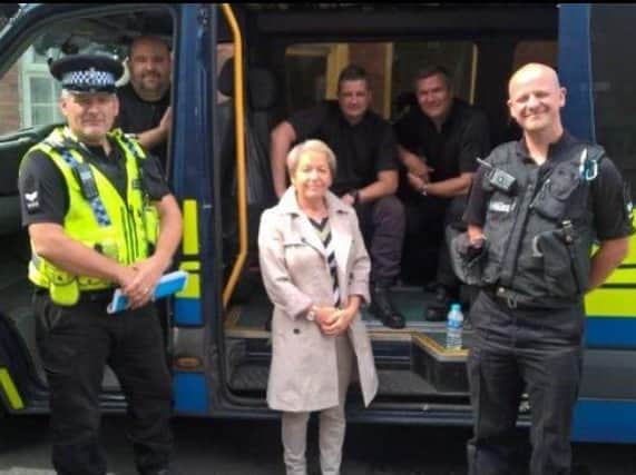 Doncaster MP, Rosie Winterton, with the officers who conducted the raid.