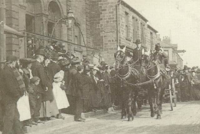 A busy street scene with an air of excitement..