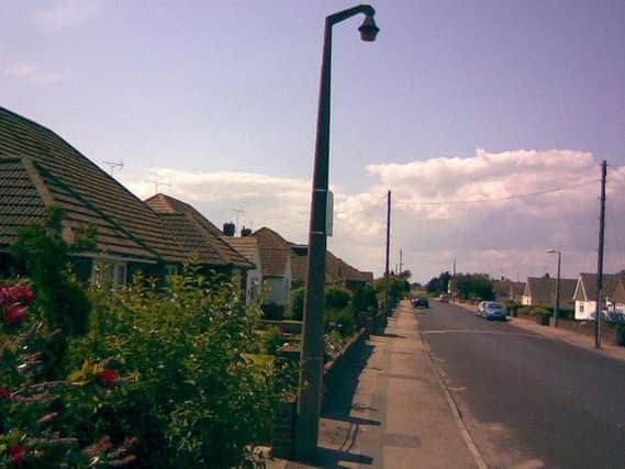fifty thousand   possibly more  pounds on lamp posts!